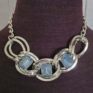 Vintage silvertone choker necklace with emerald cut faux blue topaz stones